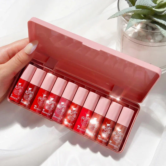 LuxeGloss Kit featuring 10 vibrant, high-shine waterproof lip glosses in a sleek pink makeup gift set box.