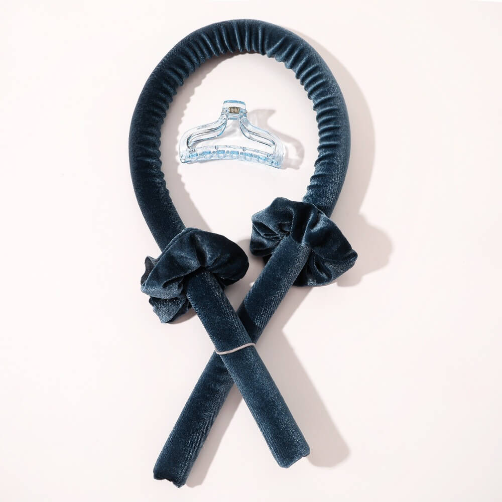 Navy blue velvet heatless hair curler set with matching scrunchies and a clear claw clip for overnight styling.