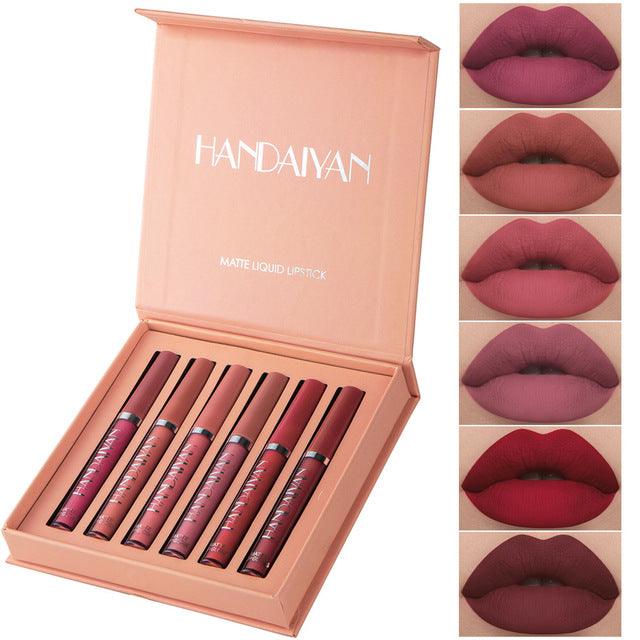 Handaiyan 6-piece matte liquid lipstick kit in a pink box with swatches showing berry, nude, and red shades on lips.
