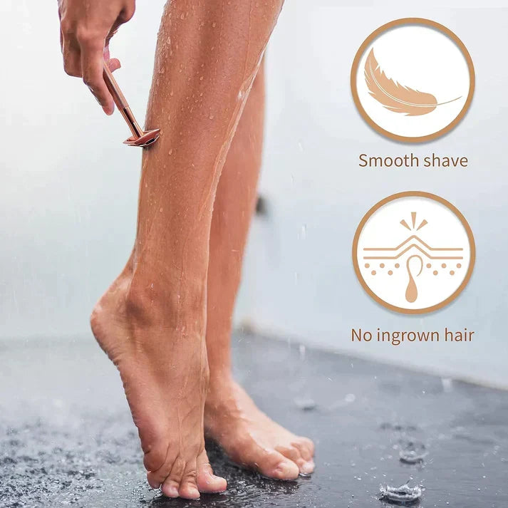 Rose gold SmoothShave safety razor being used on a leg in the shower for a smooth shave with no ingrown hairs.