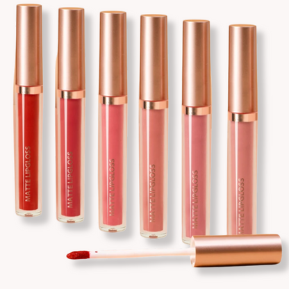 Luxe Glow 6-piece matte lip gloss kit featuring red and pink shades with rose gold caps and a velvet finish applicator.